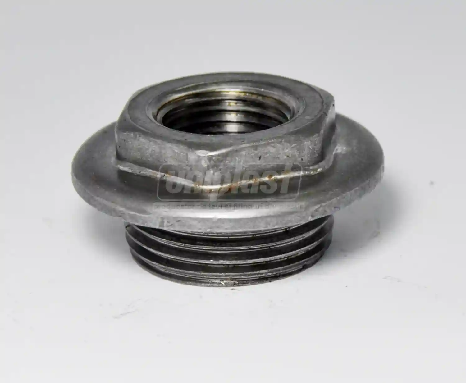 Заглушка проходная для радиатора D. 1" x 1/2" левая чугун ST